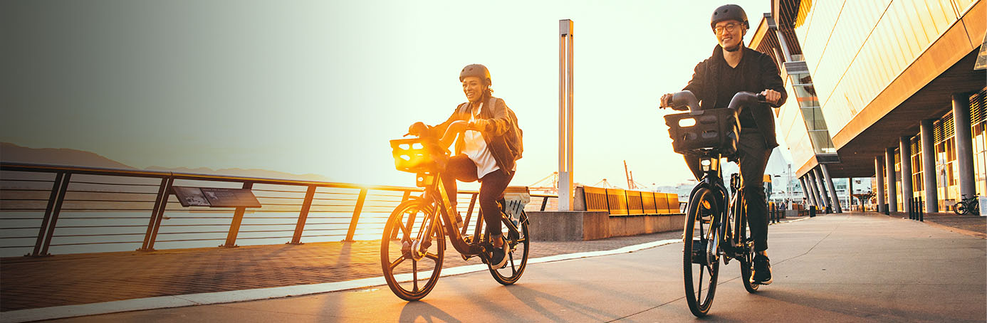 two cyclists using evolve e-bikes