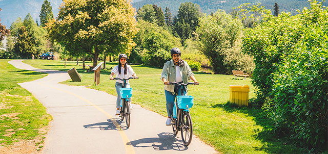 sisters cycling in the park 